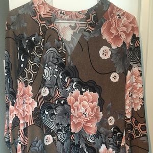 Style& Co. brand; V-neck medium top.